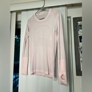 Long sleeve woman’s lululemon athletic running top with thumb holes